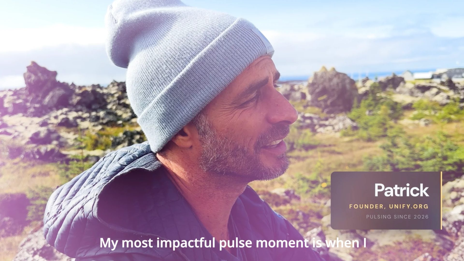 Patrick, founder of Unify.org, speaking on a lava field in Iceland